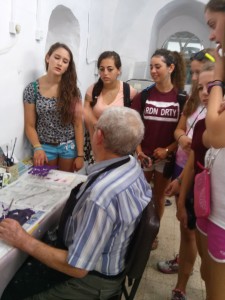 USY'ers speaking Spanish with an elderly person at Yad L'Kashish